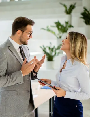 Adviser discussing financial documents with a client